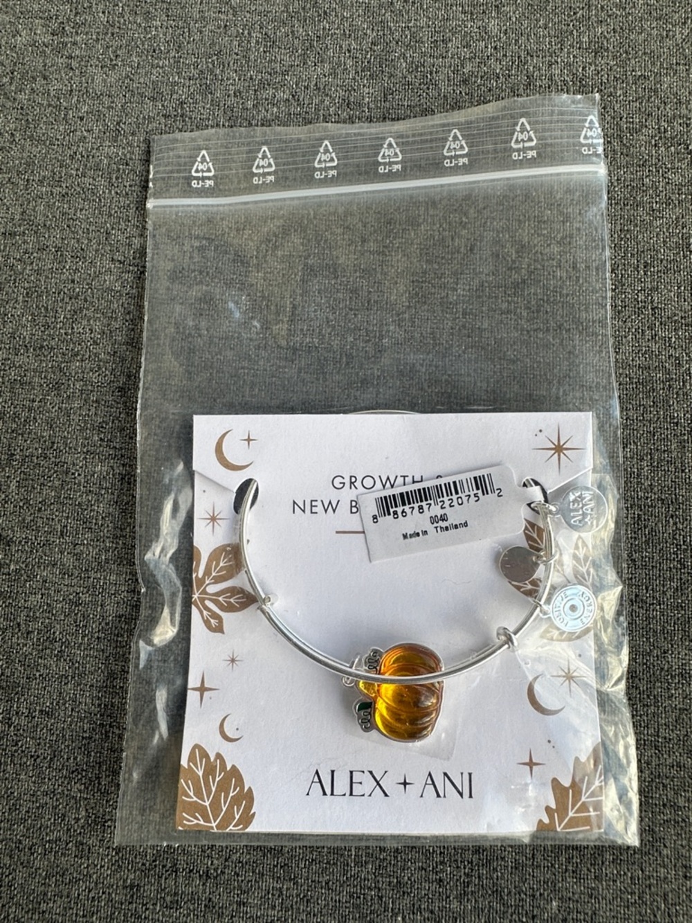 Alex and Ani Silver Bangle with Amber Pumpkin Charm